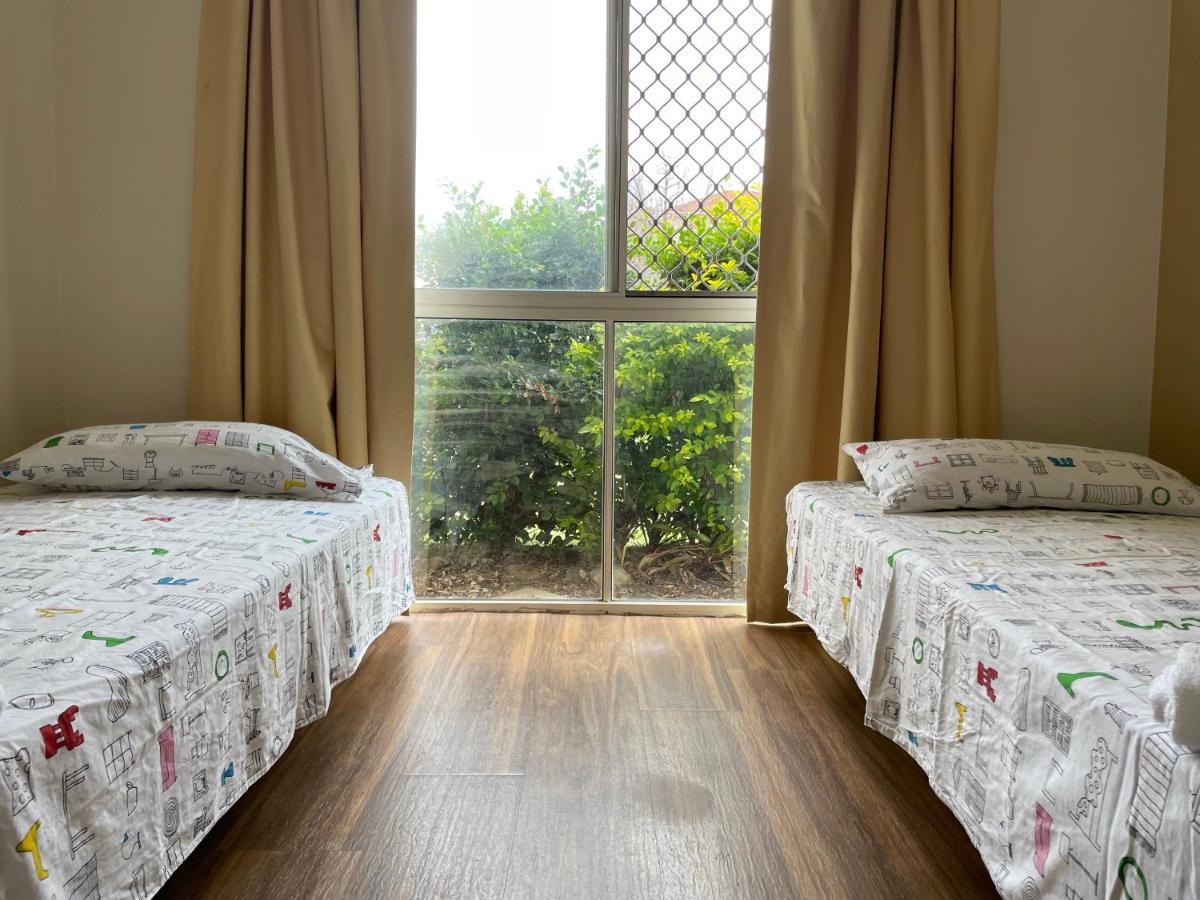 גולד קוסט Theme Parks Amituofo Homestay מראה חיצוני תמונה